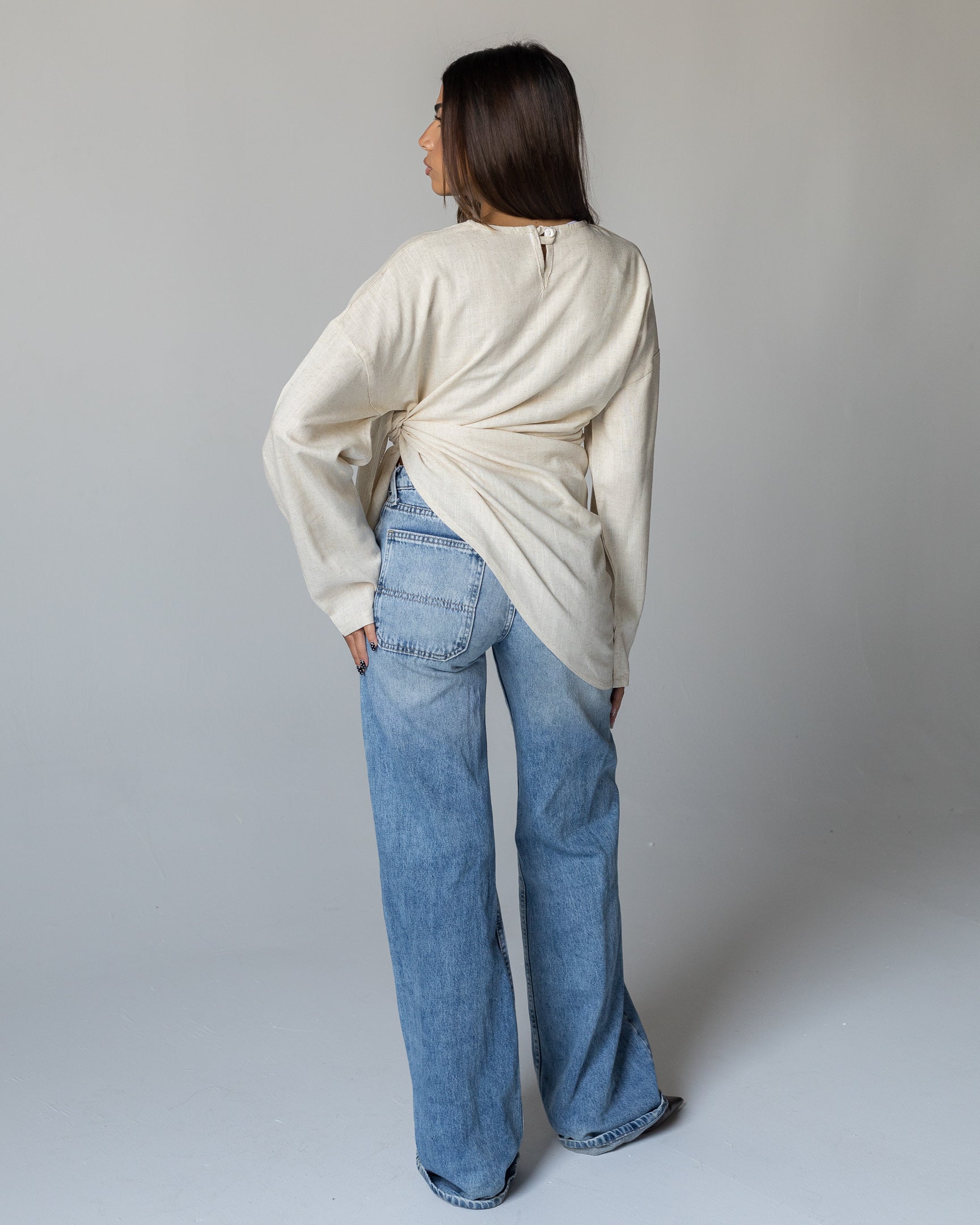 The Creme Wrap Top