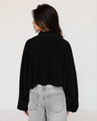 THE Black Shrug